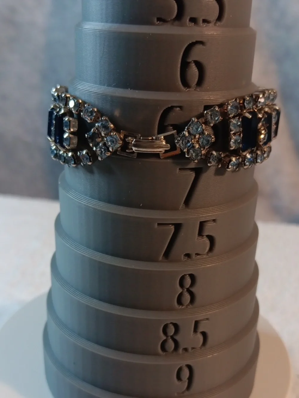 Gold-tone Bracelet with Deep Blue and Clear Stones